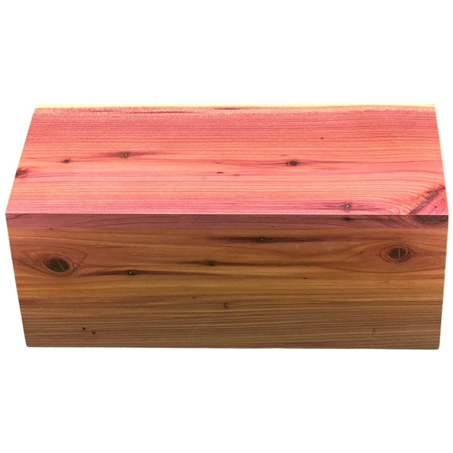 Side angled view of cedar pet urn without image